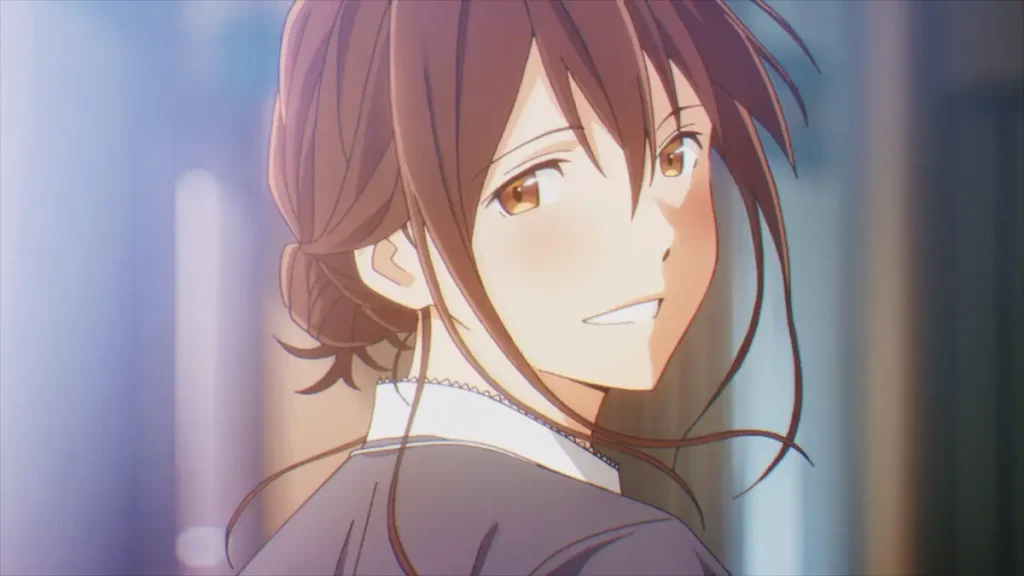 Sakura Yamauchi smiling gently with warm sunlight on her face.