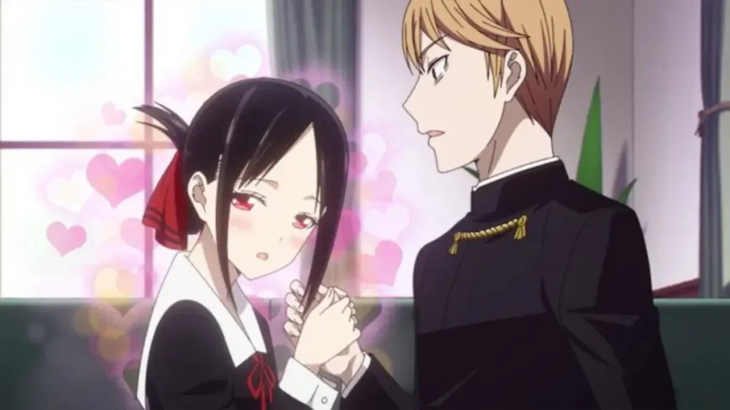 Kaguya Shinomiya and Miyuki Shirogane holding hands with blushing faces surrounded by pink hearts.