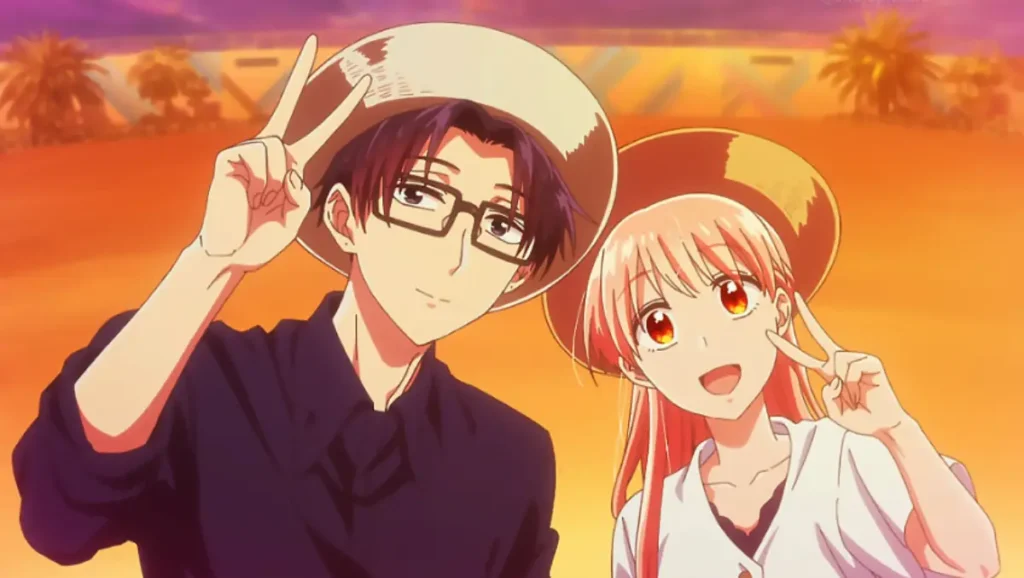 Narumi Momose and Hirotaka Nifuji smiling and posing with peace signs during sunset.